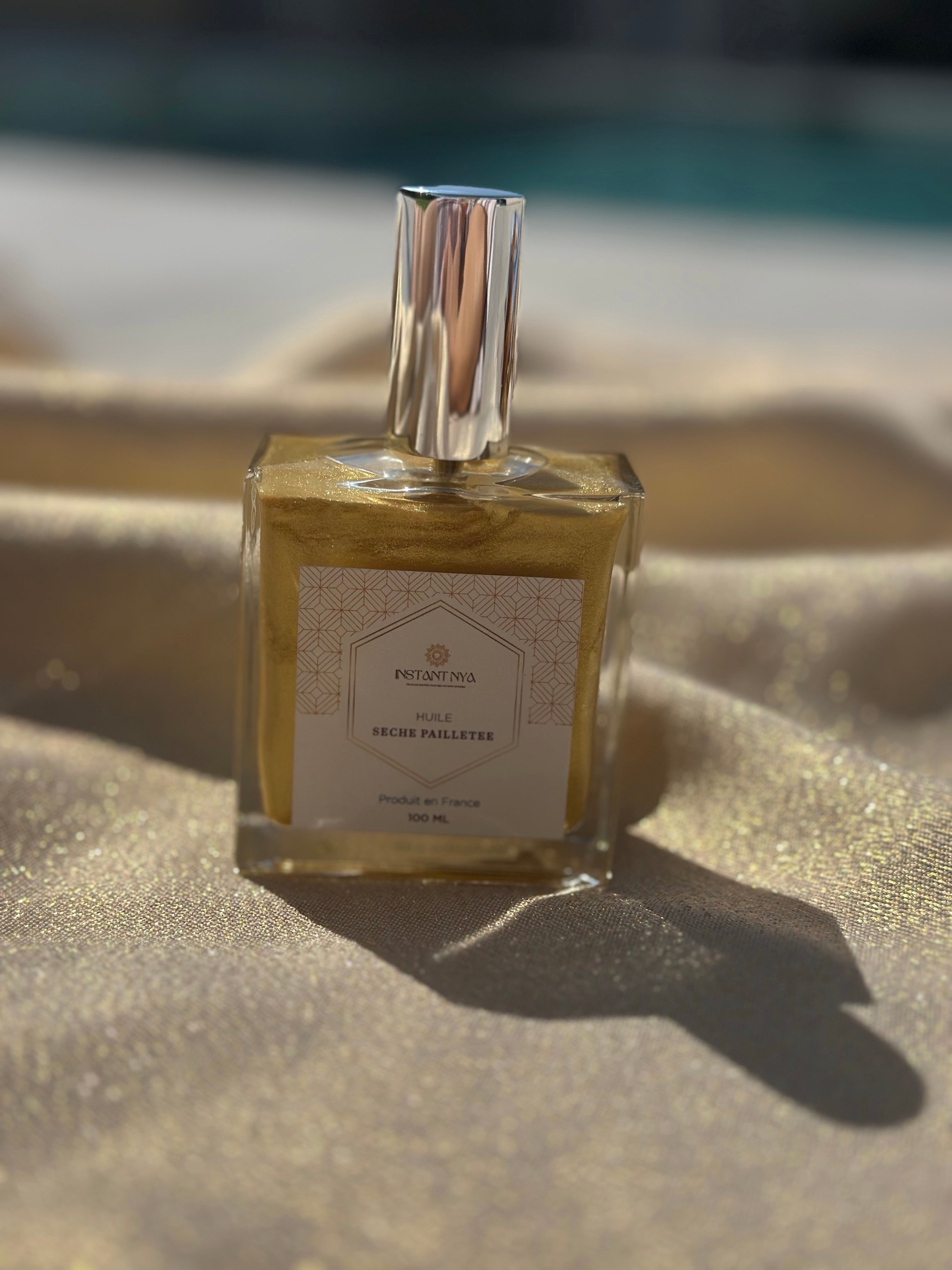 Huile pailletée